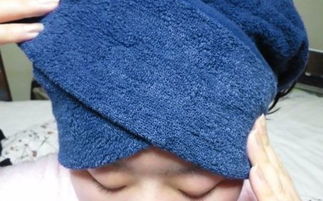 洗完头后怎么把毛巾裹在头上
