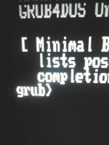 我下了个windows7舰航版的系统 安装后叫重启,重启后出现英文 开头是 grob4dos 