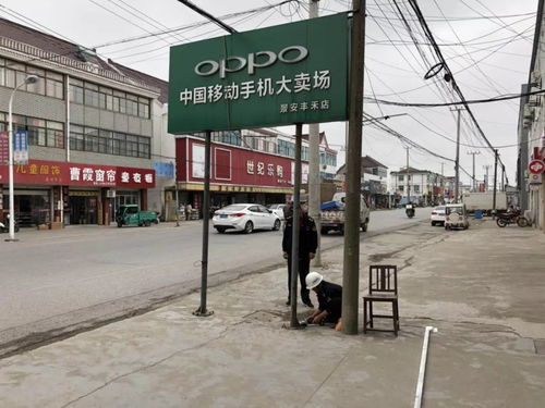 河口城管行动啦 大力整治 煞风景 的广告牌