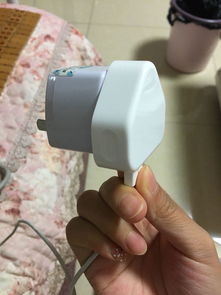 苹果6s 用原装的1A的充电器头充不进去电,但是用这种大电流的旅行用的充电器头才能冲,求怎么解决 