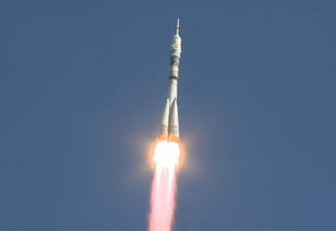 俄联盟号运载火箭发射升空 三宇航员将前往太空传递奥运圣火 高清组图 