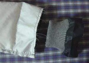羽绒服暗袋和防风袖口的制作方法 