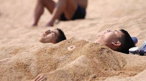 为什么去海边玩千万不能把身体埋进沙子里 有什么危害吗 