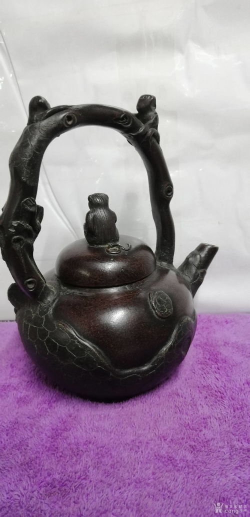 紫砂提梁茶壶 