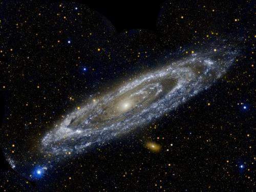 直径20万光年的仙女座星系为什么在我们看来只是一颗小星星