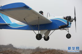 西安大学生10万元自制飞机试飞成功 