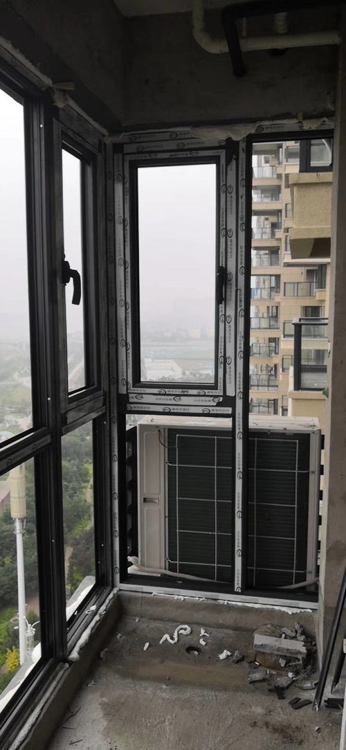 洛阳君河湾高层封阳台 70断桥铝外开门窗安装实景效果