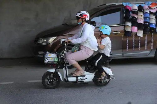 6月1日起,郑州严查骑电动车不戴头盔者,可事实却