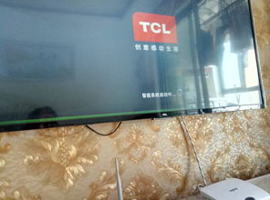 TCL液晶电视屏幕最下方出现一道荧绿色横纹,型号是L49P1 UD 
